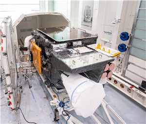 MTG-I1 being placed in its container for shipment