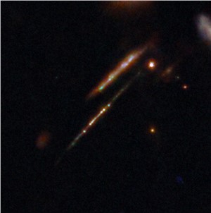 Star clusters in the Cosmic Gems arc (cropped)