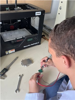 engineer tests a critical electronic component