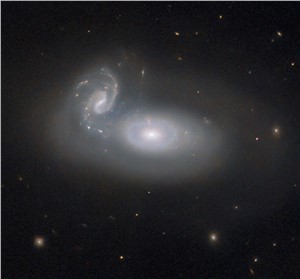 interacting spiral galaxies called MCG+05-31-045 ESA/Hubble & NASA, R. J. Foley (UC Santa Cruz) &copy;